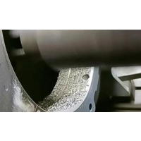 Continuity of Microstructure and Thermal Stress Evolution in Laser Additive Manufacturing-CNC Reprocessed Composite Components